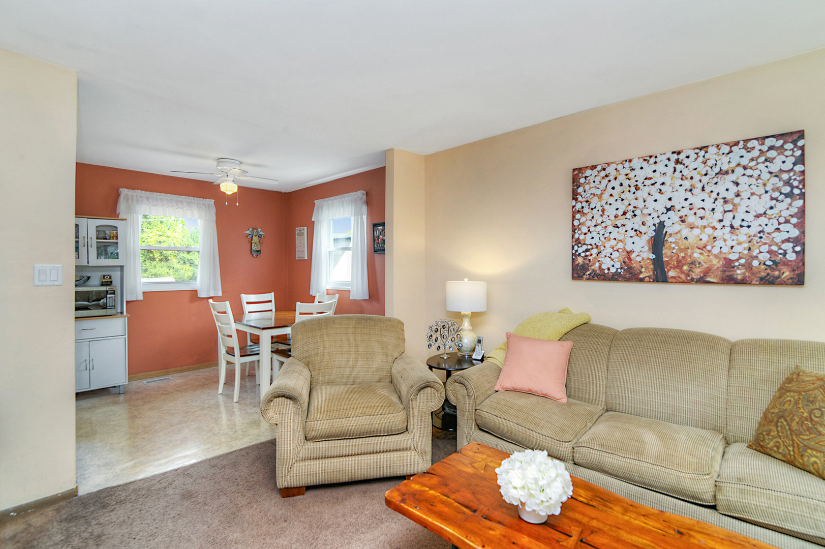 720 Terry Road Glendale Heights, IL 60139 - Photo 12 of 28 a living room with furniture and a large window