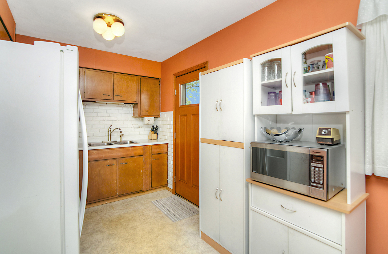 720 Terry Road Glendale Heights, IL 60139 - Photo 14 of 28 a kitchen with stainless steel appliances granite countertop a refrigerator and a stove top oven