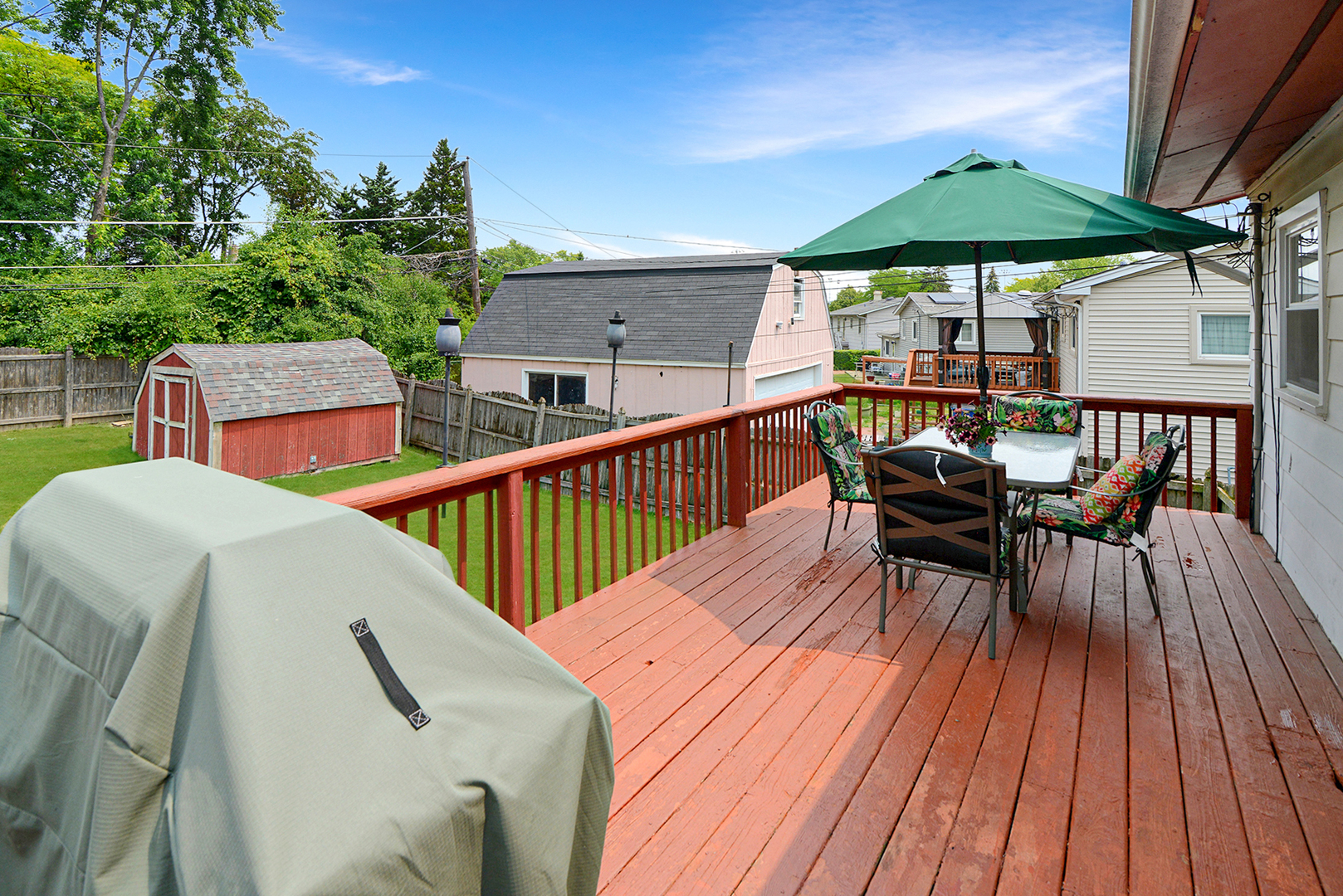 720 Terry Road Glendale Heights, IL 60139 - Photo 2 of 28 a view of deck with barbeque grill and wooden floor