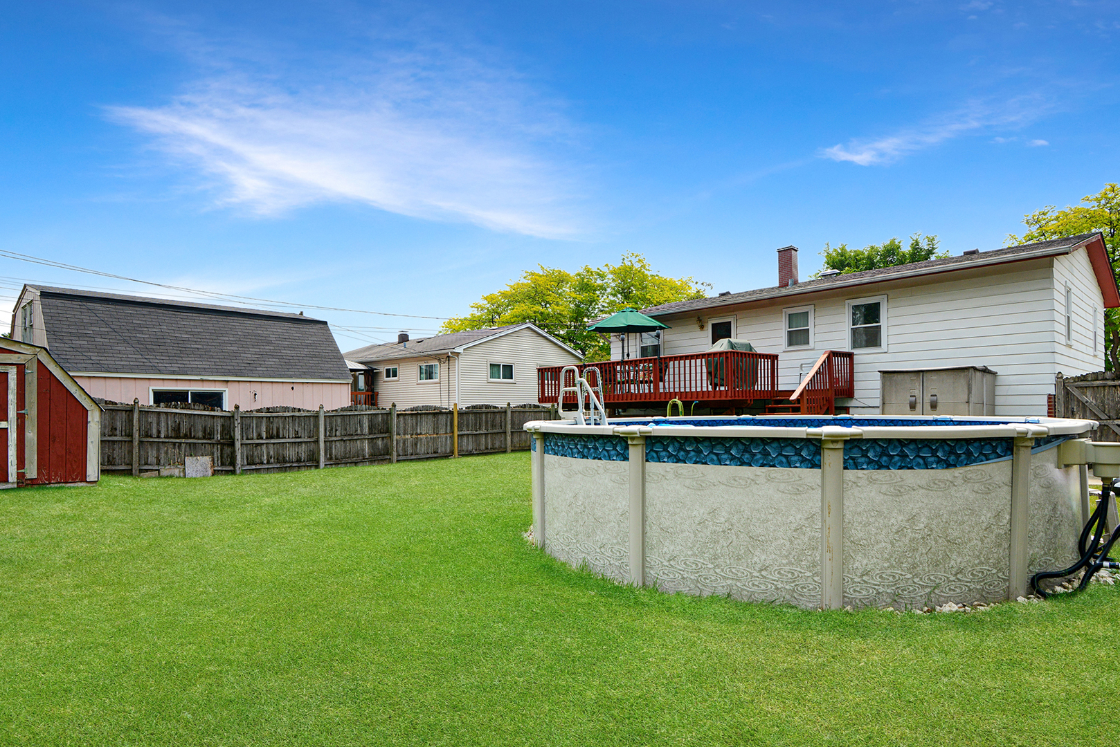 720 Terry Road Glendale Heights, IL 60139 - Photo 6 of 28 a view of a house with a yard and sitting area