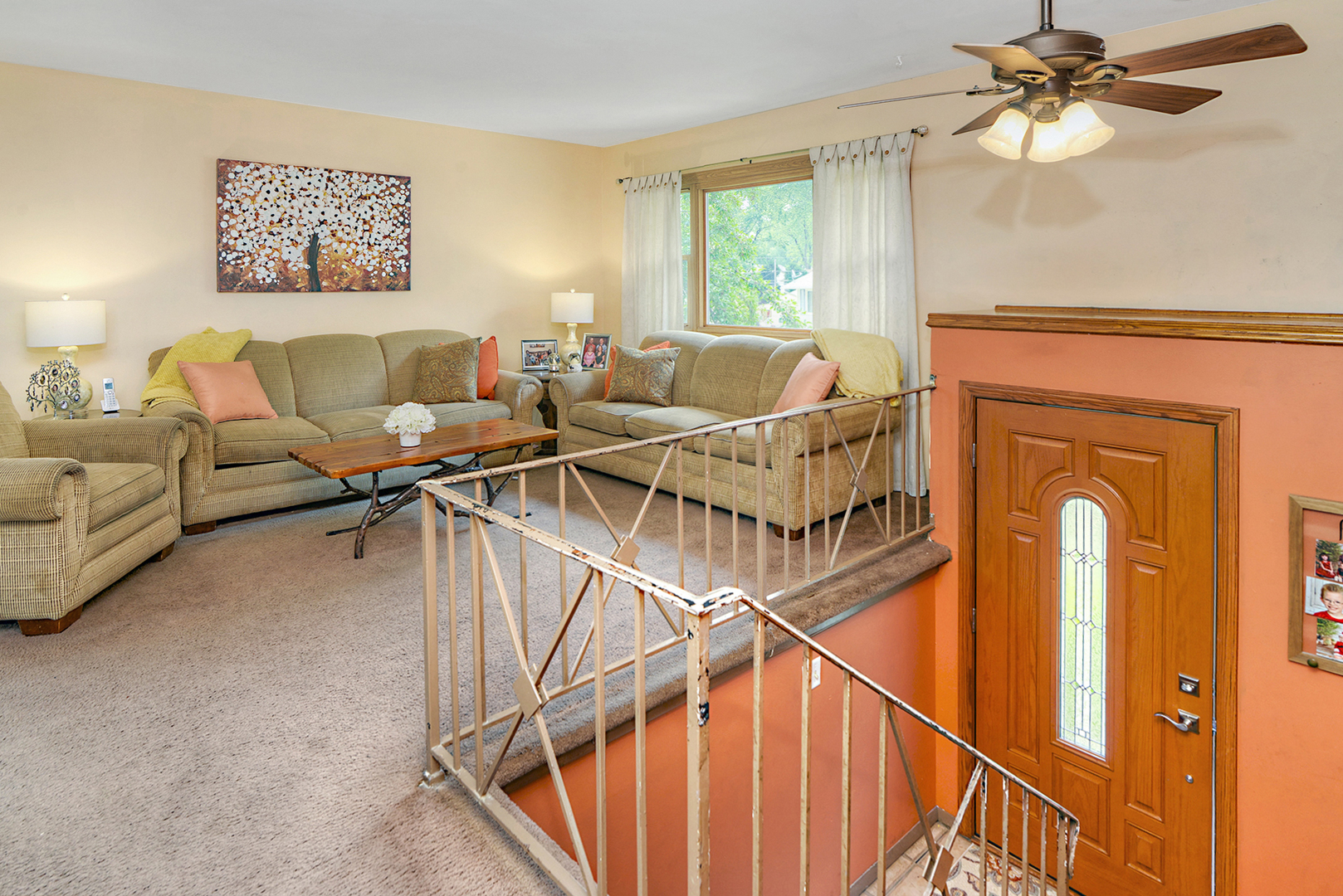 720 Terry Road Glendale Heights, IL 60139 - Photo 7 of 28 a living room with furniture and a window