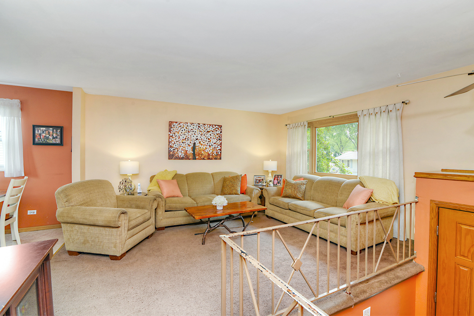 720 Terry Road Glendale Heights, IL 60139 - Photo 8 of 28 a living room with furniture and a window