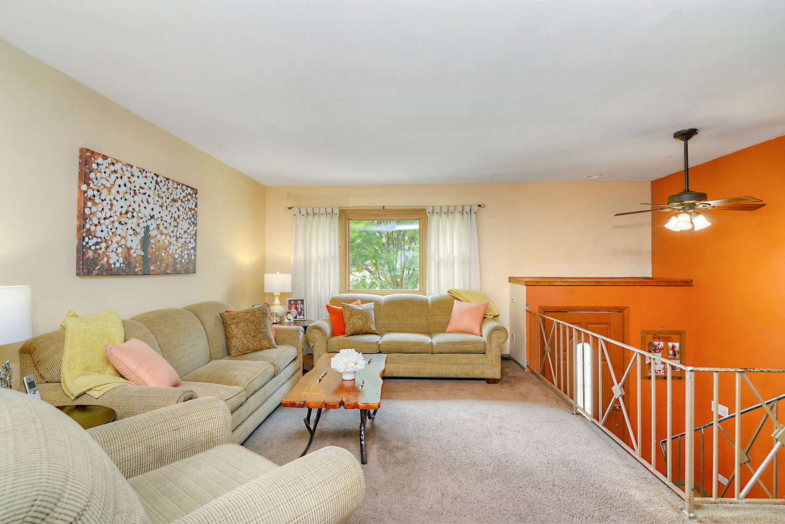 720 Terry Road Glendale Heights, IL 60139 - Photo 9 of 28 a living room with furniture and a window