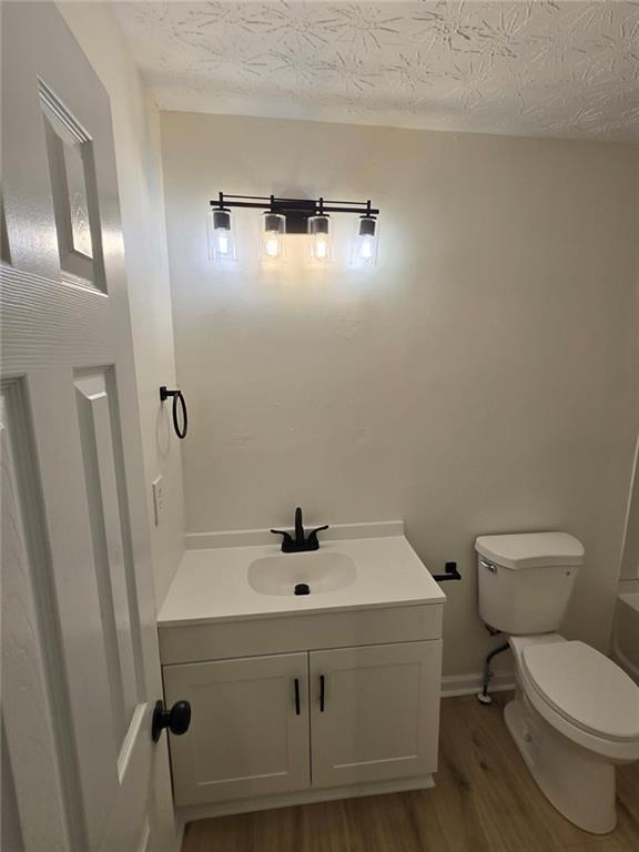2868 Vining Ridge Terrace Decatur, GA 30034 - Photo 4 of 16 a bathroom with a sink a toilet and shower