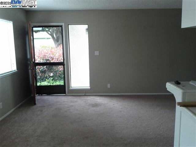 Pleasanton Pleasanton, CA 94588 - Photo 7 of 17 an empty room with windows