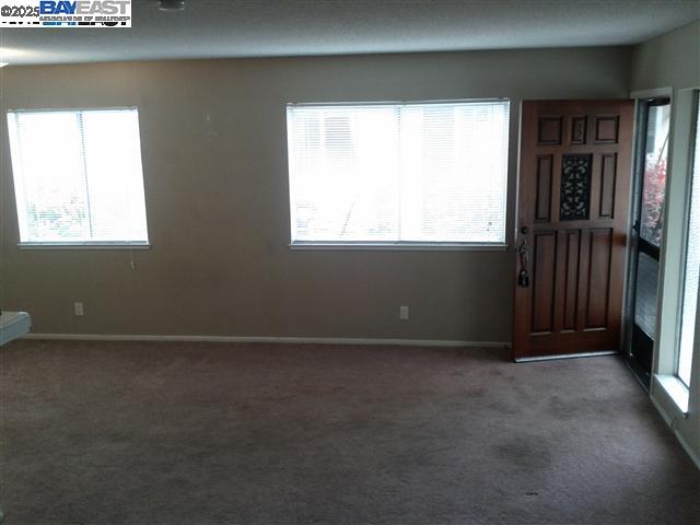 Pleasanton Pleasanton, CA 94588 - Photo 8 of 17 an empty room with windows