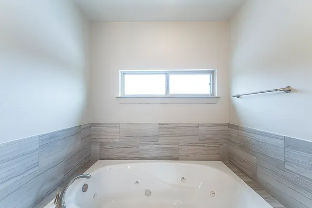 a bathroom with a bathtub