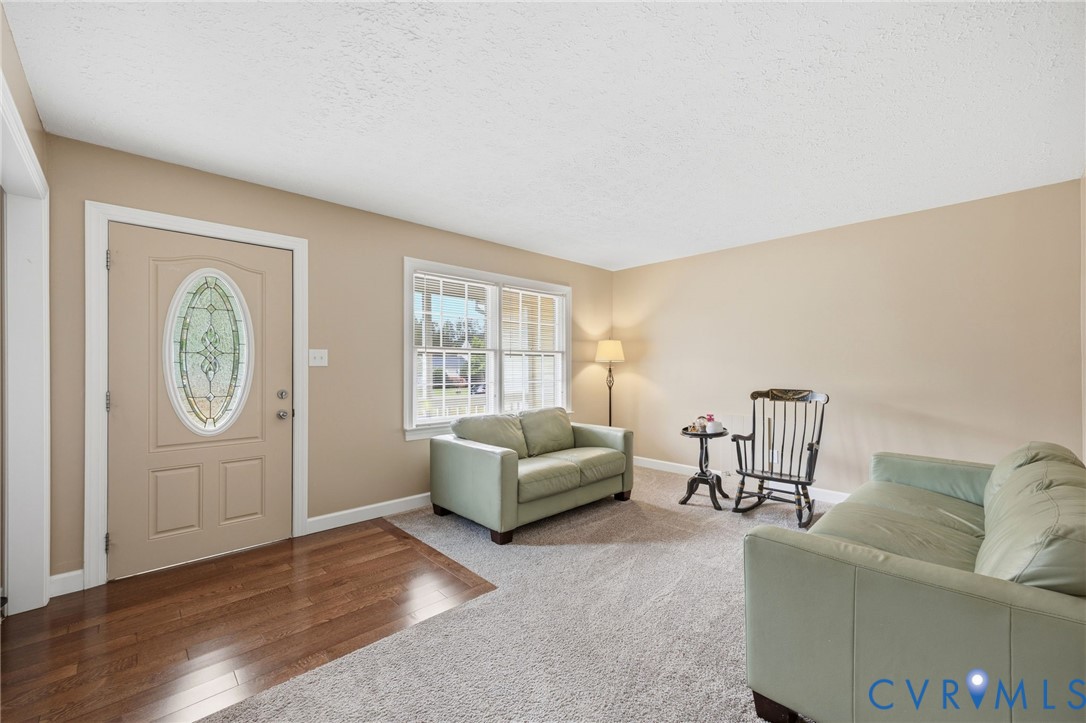 5991 Scott Road Gloucester, VA 23061 - Photo 27 of 35 a living room with furniture and a window
