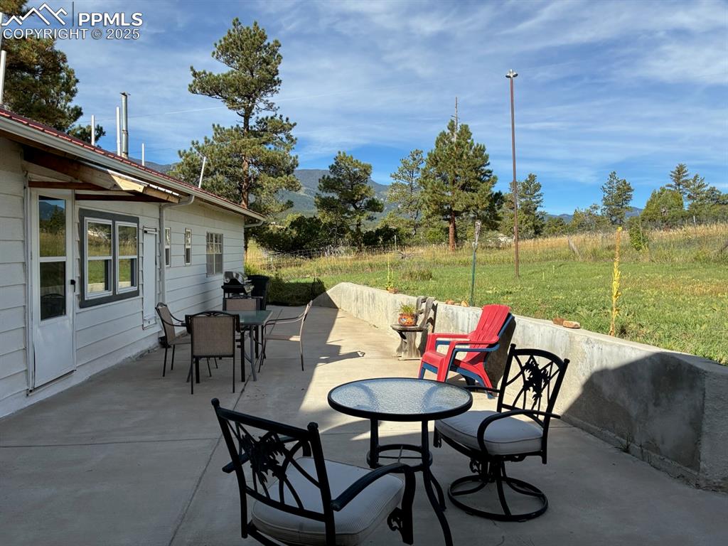 8201 Old San Isabel Road Rye, CO 81069 - Photo 27 of 30 a lake view with a sitting space and garden