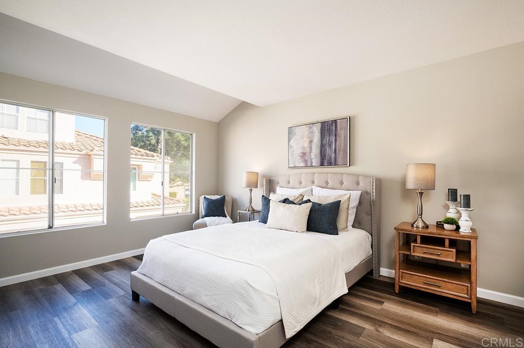 1340 Serena Circle, Unit 1 Chula Vista, CA 91910 - Photo 16 of 31 a bedroom with a bed and a window
