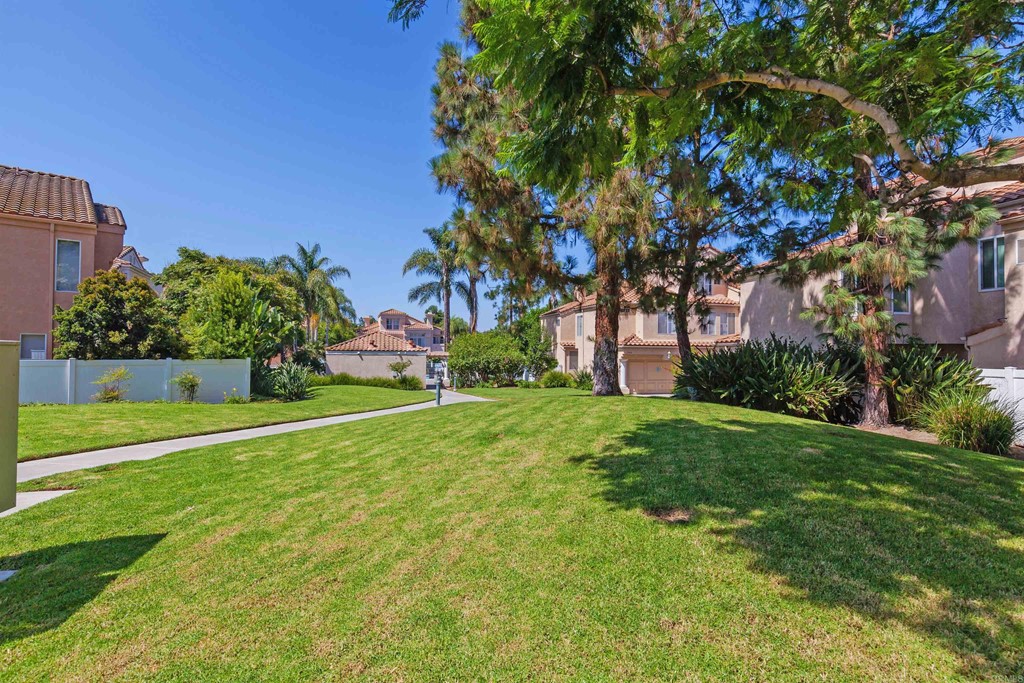 1340 Serena Circle, Unit 1 Chula Vista, CA 91910 - Photo 26 of 31 a view of a house with a yard