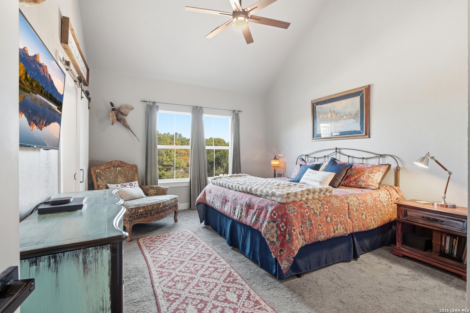 2295 Tanglewood Trail Spring Branch, TX 78070 - Photo 14 of 37 a bedroom with a bed and window