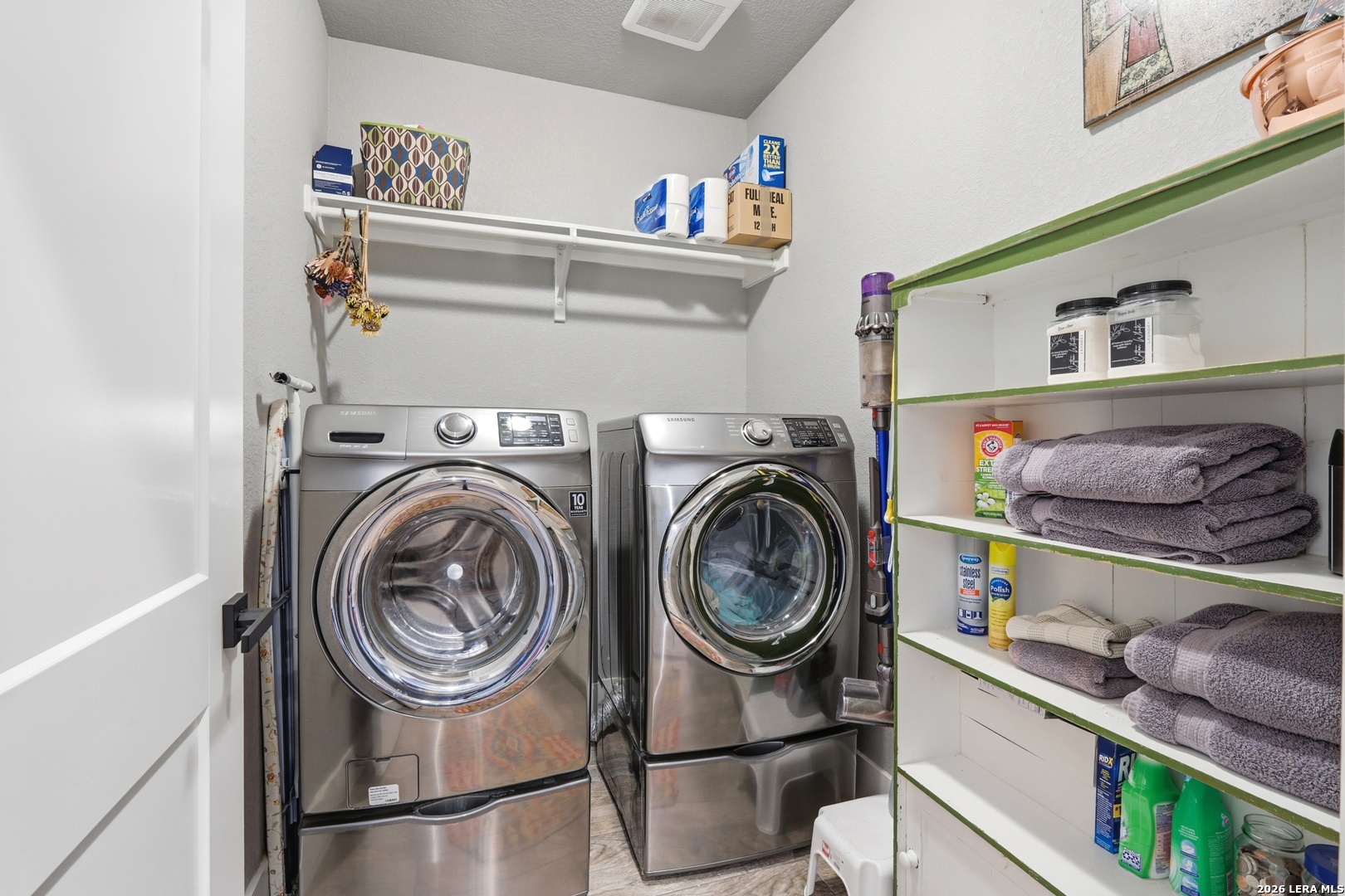 2295 Tanglewood Trail Spring Branch, TX 78070 - Photo 20 of 37 a utility room with sink dryer and washer