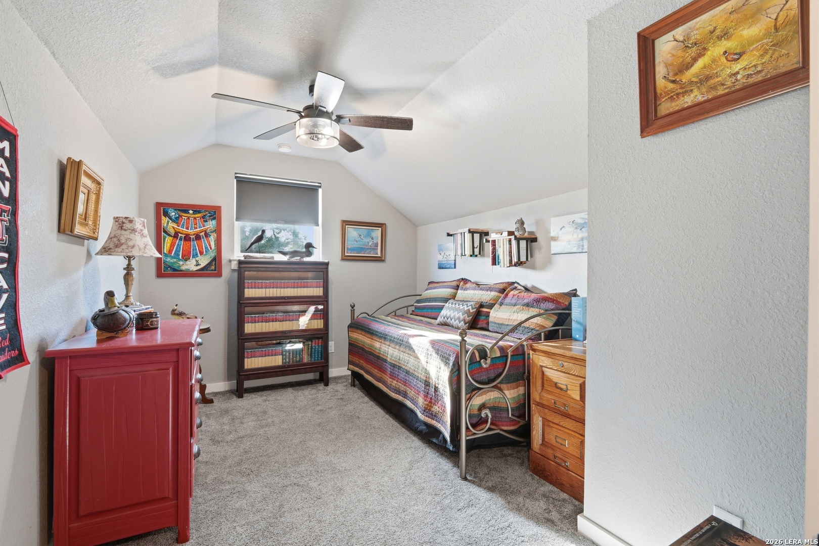2295 Tanglewood Trail Spring Branch, TX 78070 - Photo 23 of 37 a bedroom with a bed and a furniture