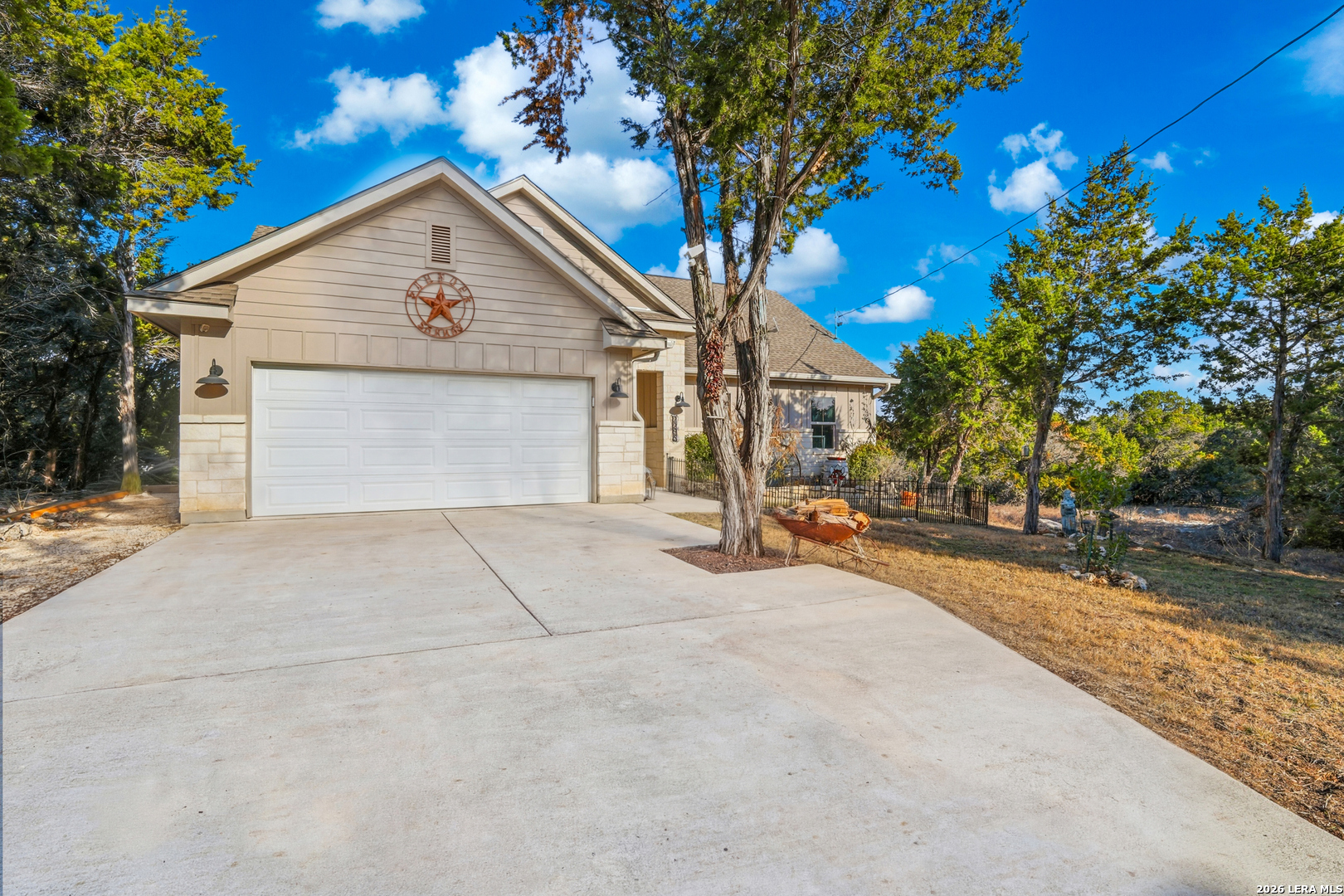 2295 Tanglewood Trail Spring Branch, TX 78070 - Photo 25 of 37 a view of backyard of house