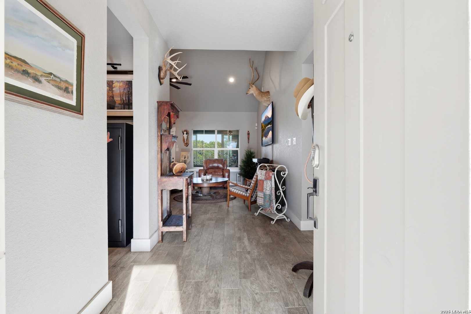 2295 Tanglewood Trail Spring Branch, TX 78070 - Photo 5 of 37 a view of a livingroom with furniture and a window