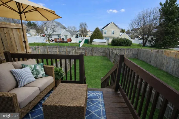 a view of a patio on the roof deck