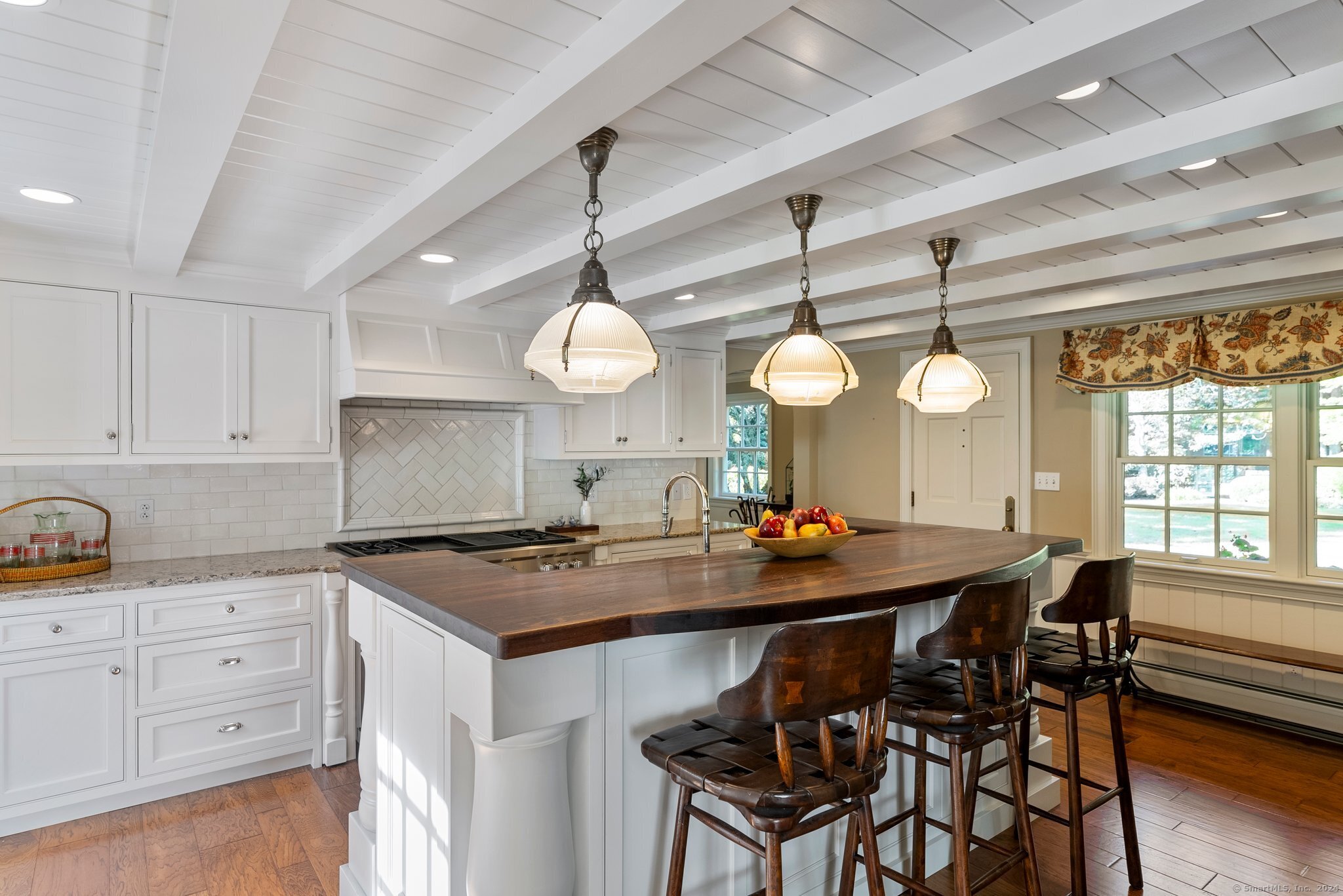 6 Pine Hill Road Burlington, CT 06013 - Photo 11 of 40 a kitchen with a table and chairs in it