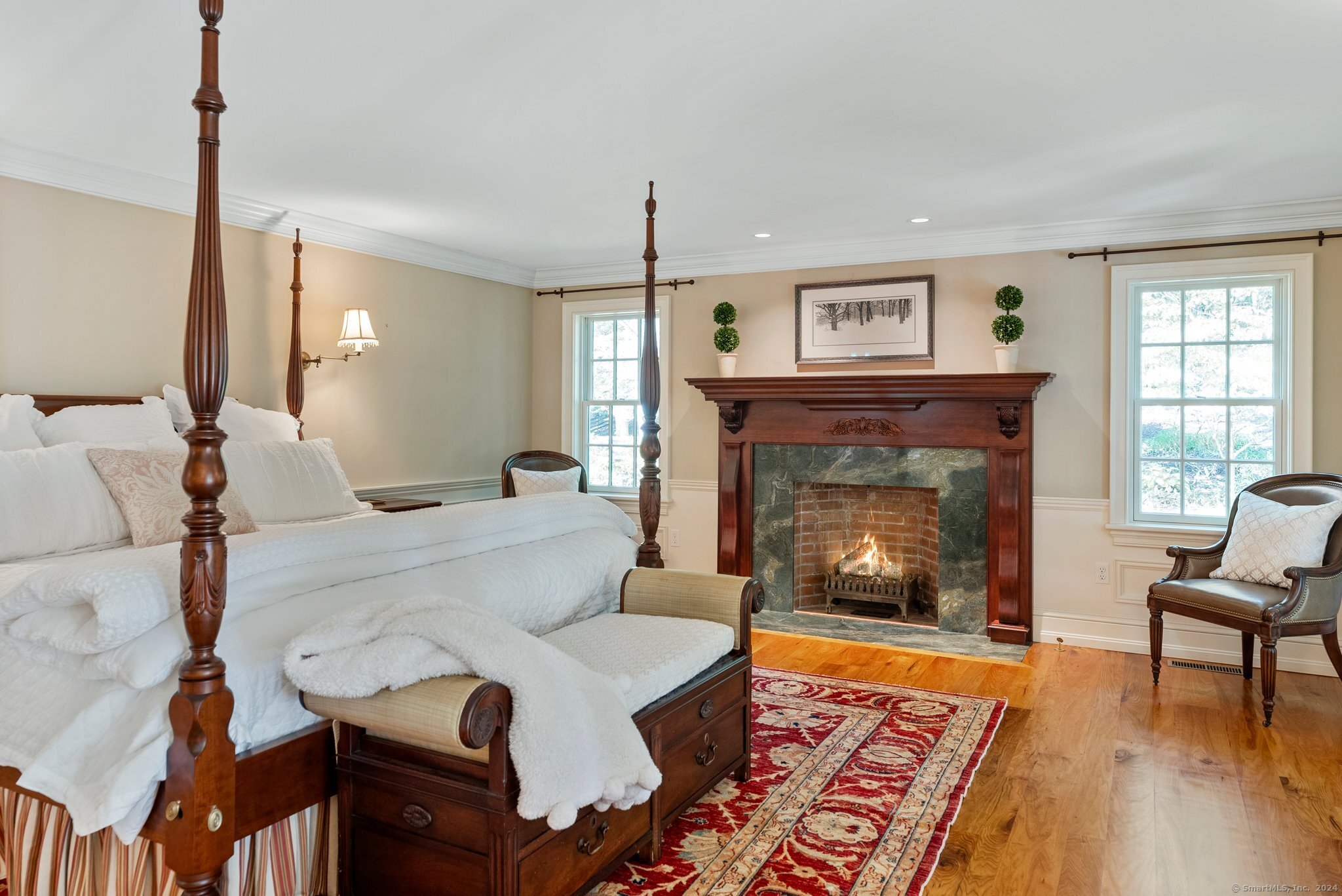 6 Pine Hill Road Burlington, CT 06013 - Photo 21 of 40 a living room with furniture and a fireplace