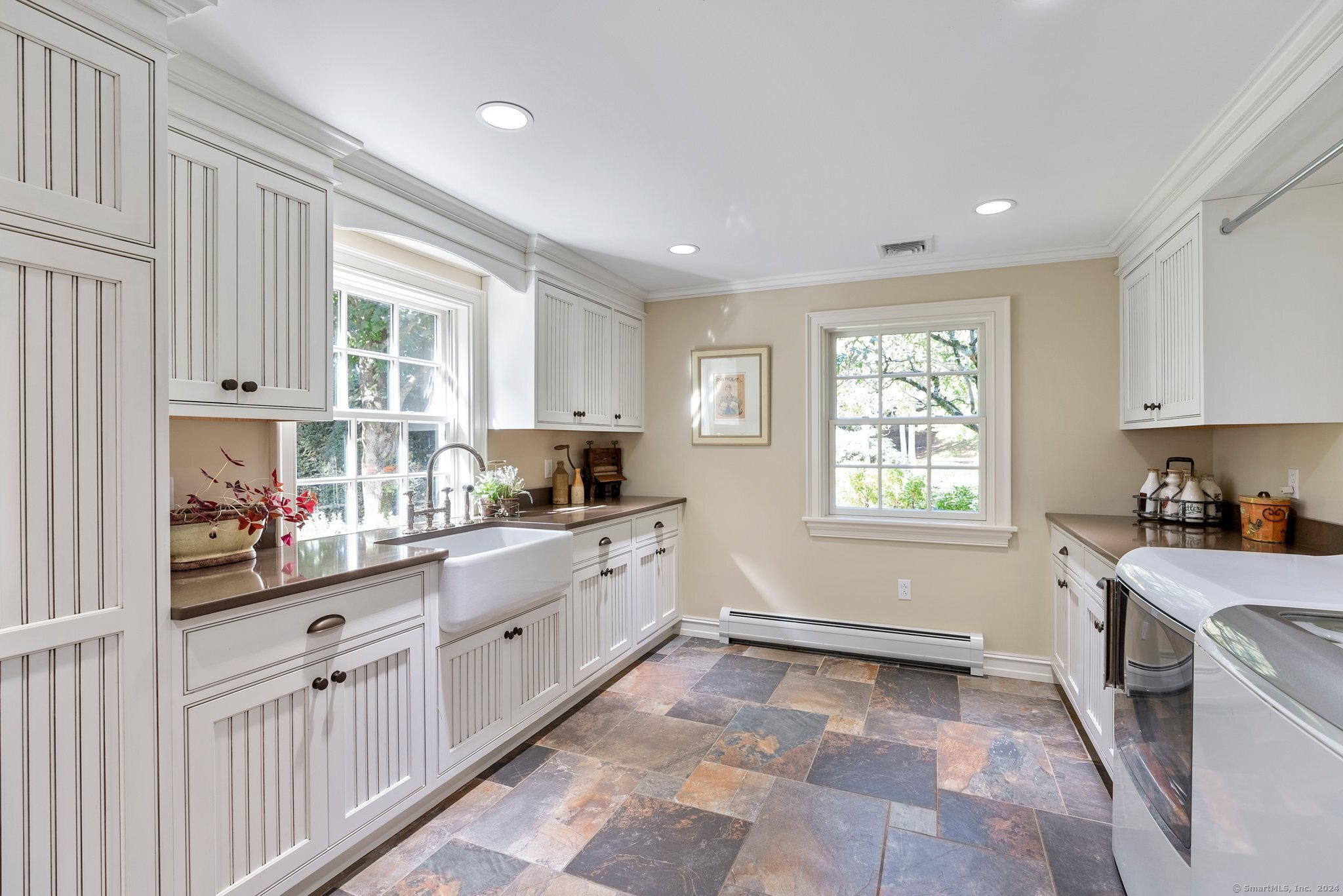 6 Pine Hill Road Burlington, CT 06013 - Photo 24 of 40 a kitchen with granite countertop a stove sink and cabinets