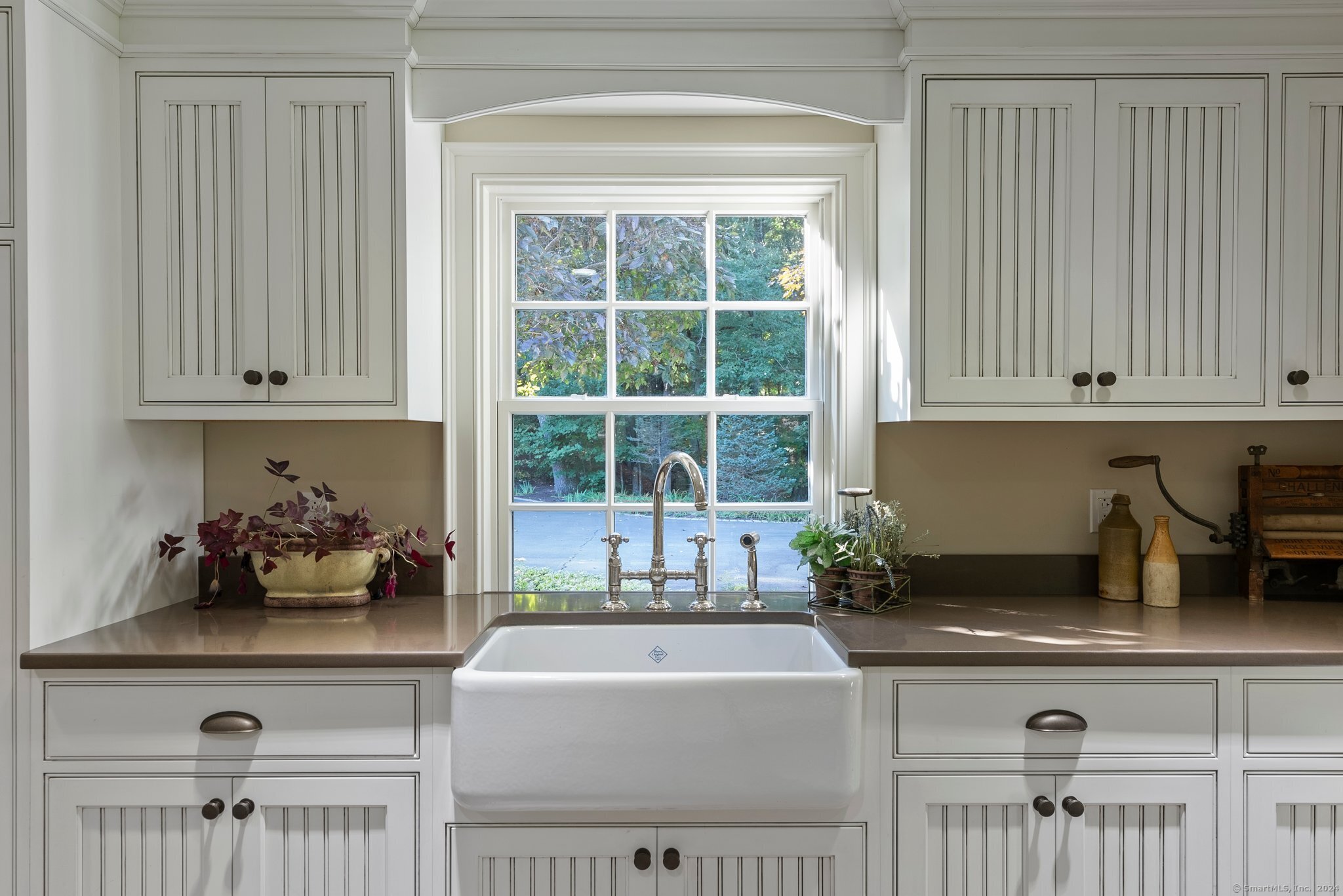 6 Pine Hill Road Burlington, CT 06013 - Photo 25 of 40 a kitchen with a window and white cabinets