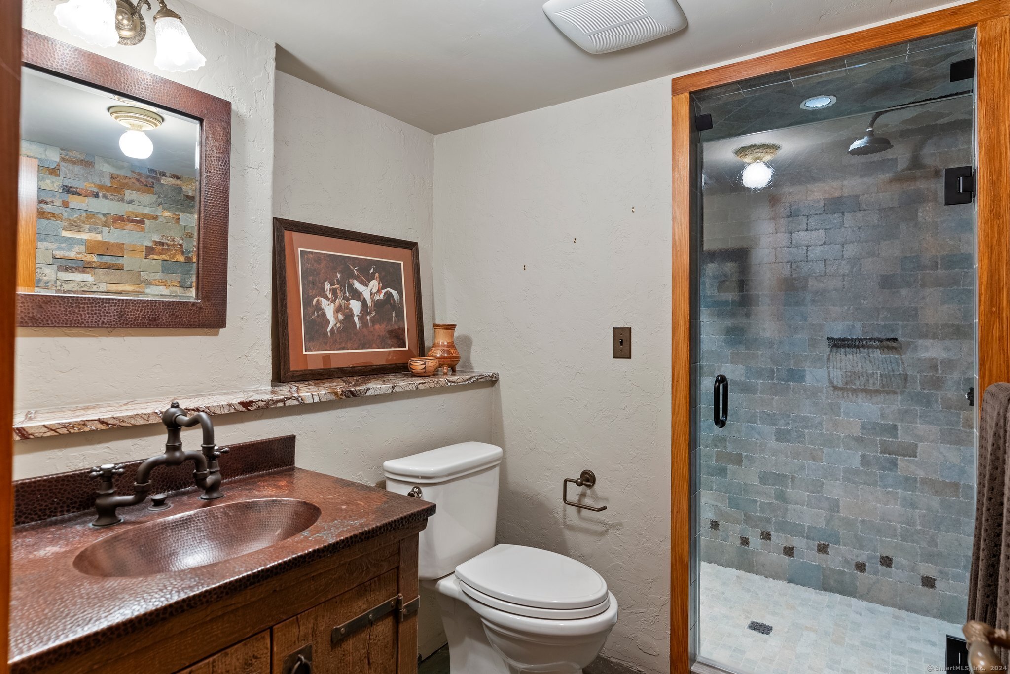 6 Pine Hill Road Burlington, CT 06013 - Photo 29 of 40 a bathroom with a sink a toilet and shower