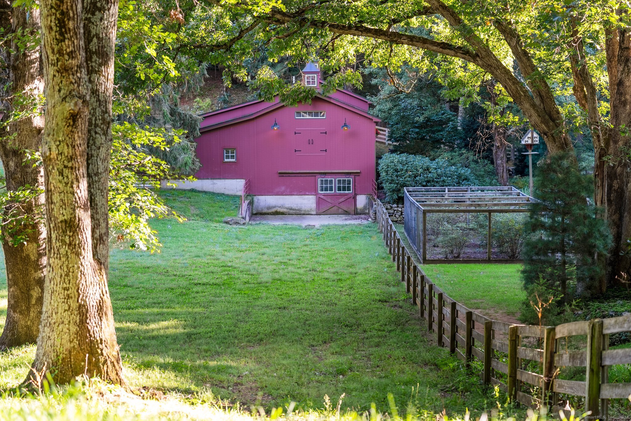 6 Pine Hill Road Burlington, CT 06013 - Photo 5 of 40 a backyard of a house with table and chairs