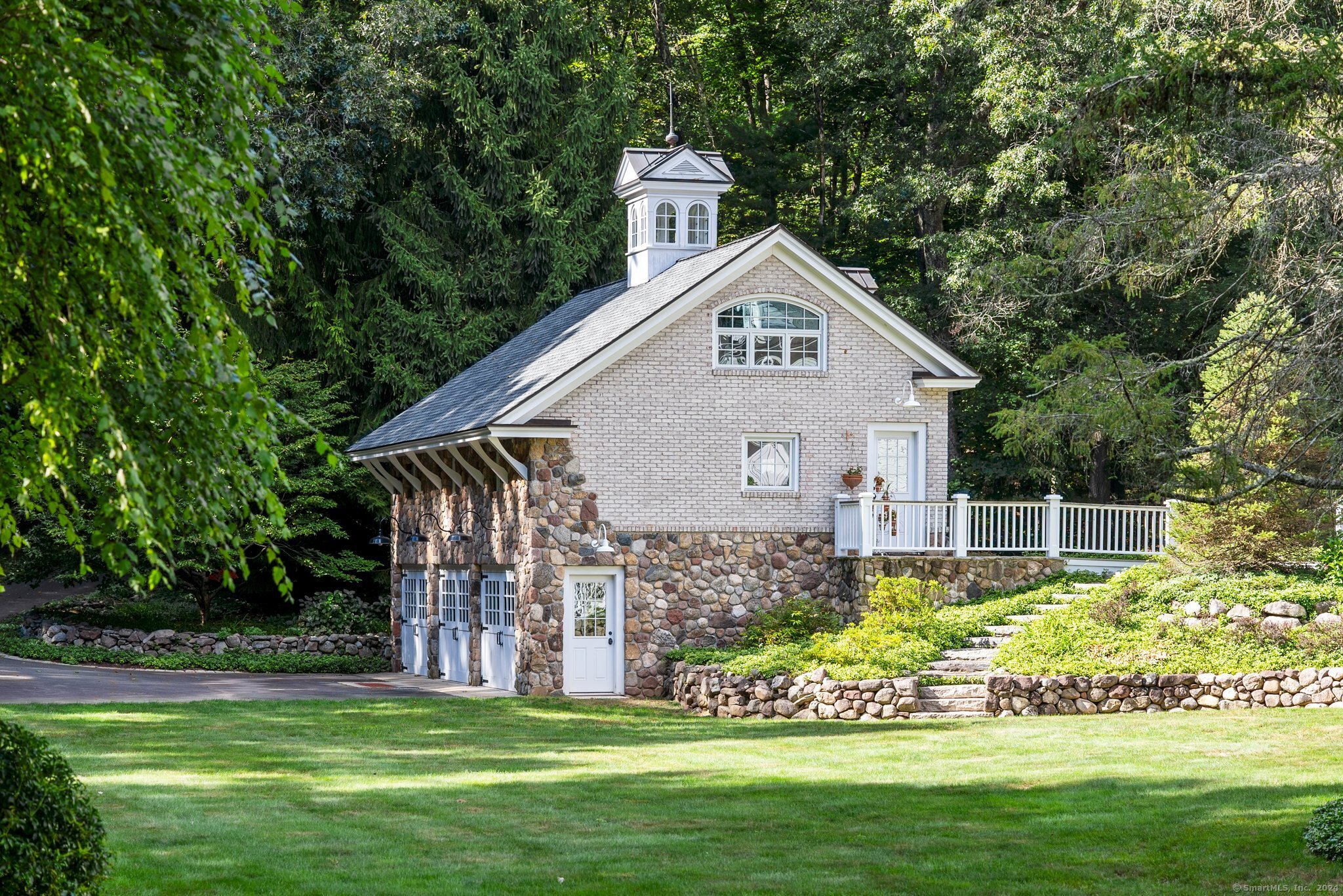 6 Pine Hill Road Burlington, CT 06013 - Photo 8 of 40 a front view of a house with a garden