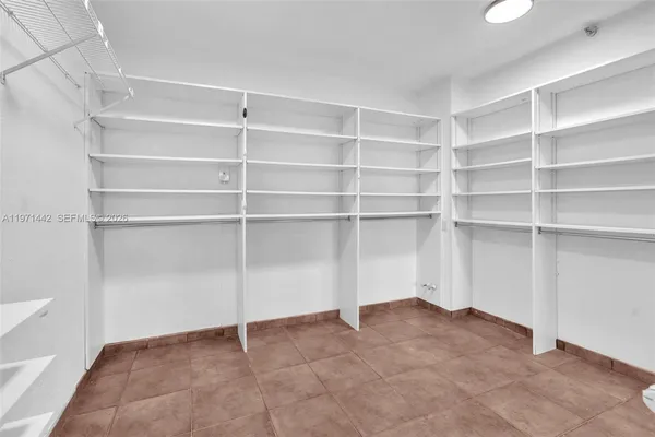 a view of an empty room with empty racks