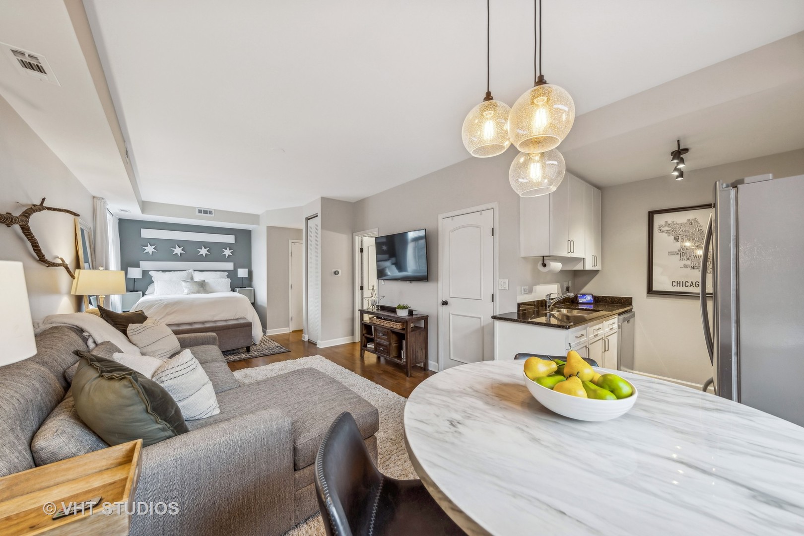 680 North Green Street, Unit 413 Chicago, IL 60642 - Photo 10 of 12 a view of a dining room with furniture
