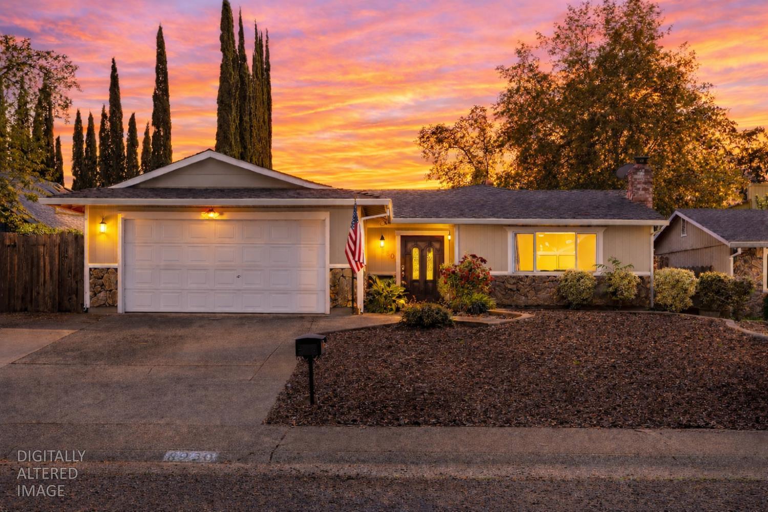 8930 Genoa Avenue Orangevale, CA 95662 - Photo 1 of 46 a front view of a house with garden