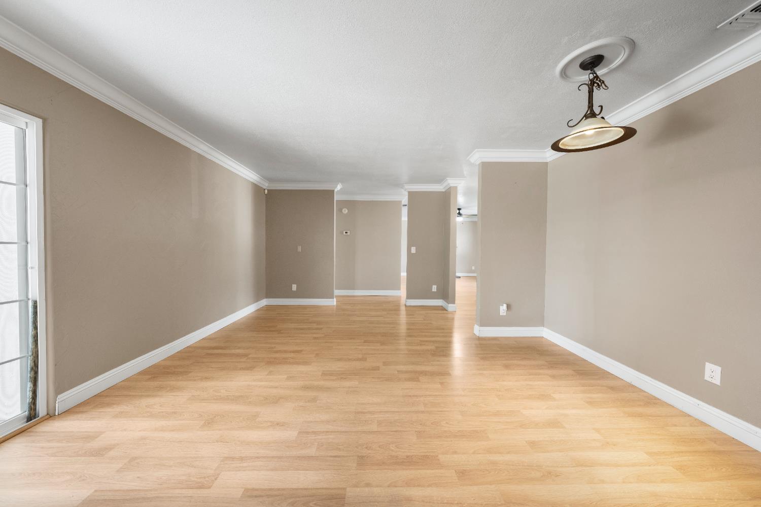 8930 Genoa Avenue Orangevale, CA 95662 - Photo 12 of 46 a view of empty room with wooden floor
