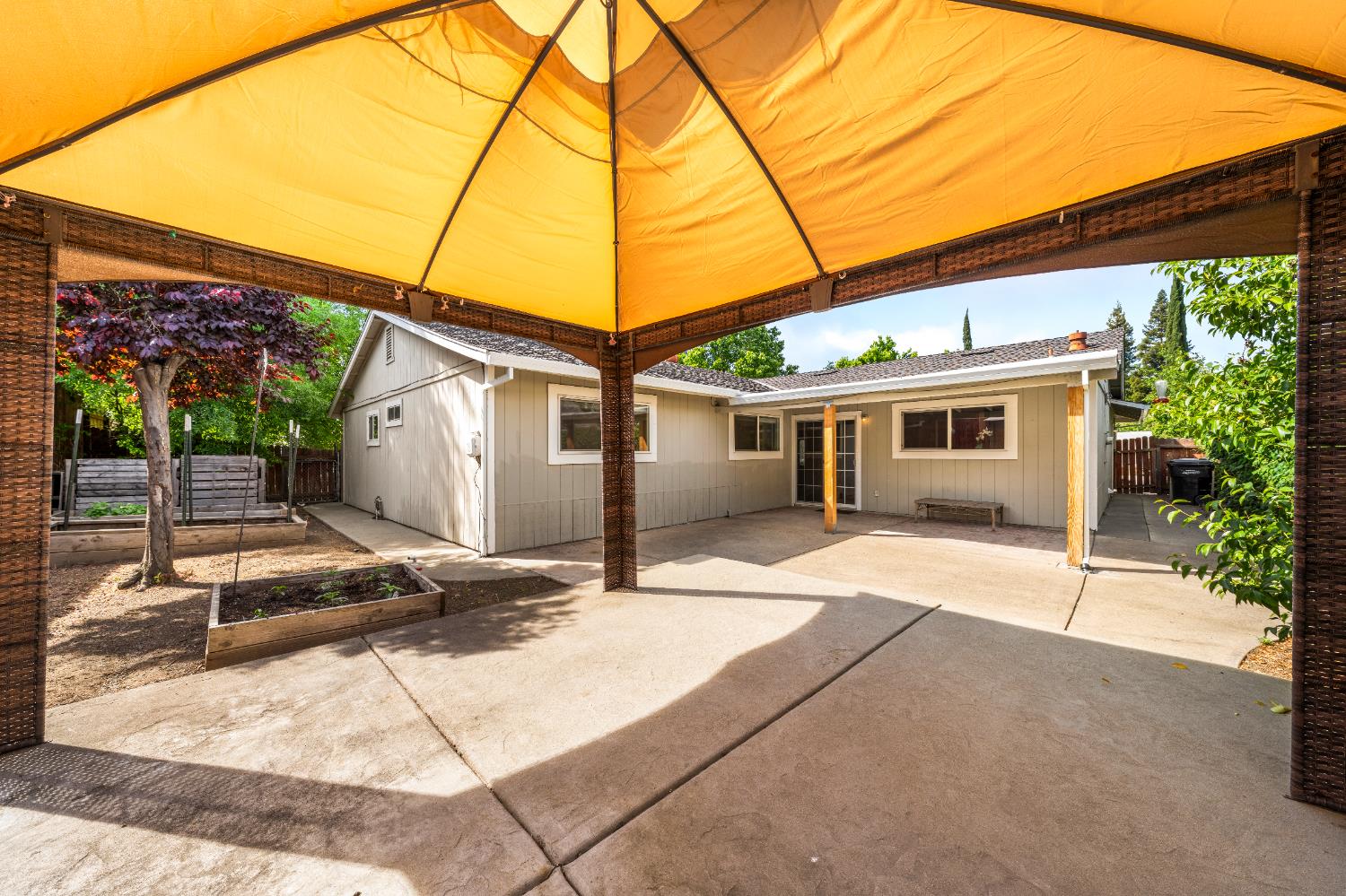 8930 Genoa Avenue Orangevale, CA 95662 - Photo 33 of 46 a backyard of a house with seating space and yard