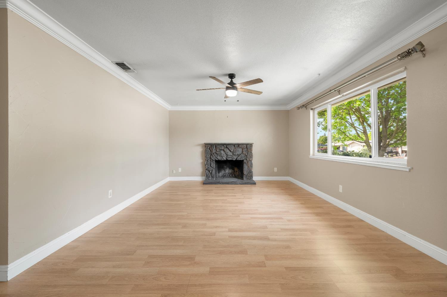 8930 Genoa Avenue Orangevale, CA 95662 - Photo 5 of 46 a view of an empty room with a window