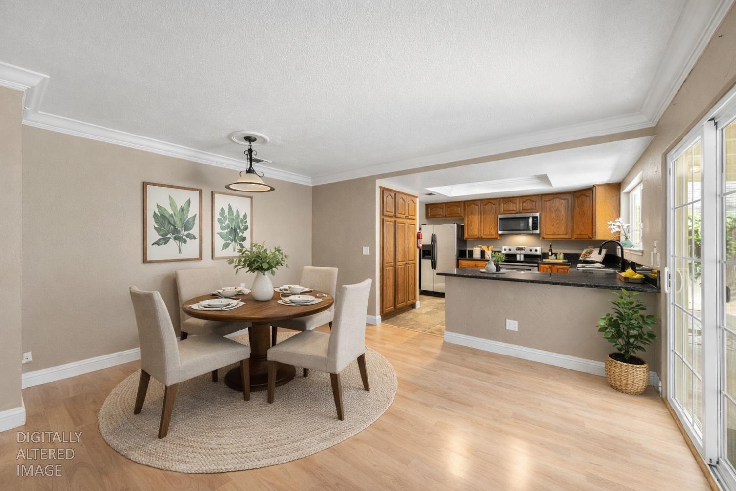 8930 Genoa Avenue Orangevale, CA 95662 - Photo 7 of 46 a view of a dining room with furniture and a kitchen