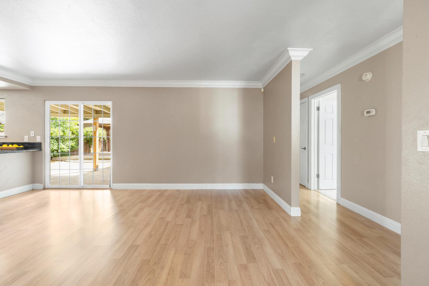 8930 Genoa Avenue Orangevale, CA 95662 - Photo 10 of 46 wooden floor in an empty room with a window