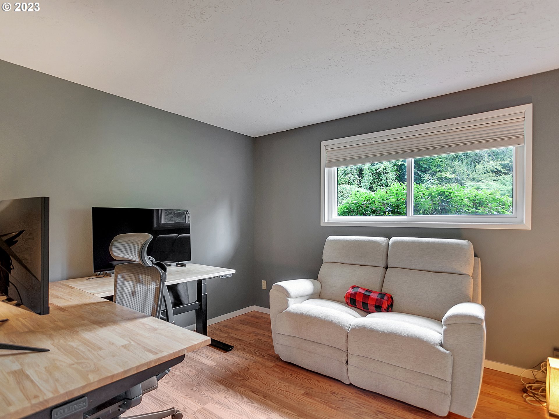 5715 Southwest Pendleton Street Portland, OR 97221 - Photo 18 of 31 a living room with furniture and a window