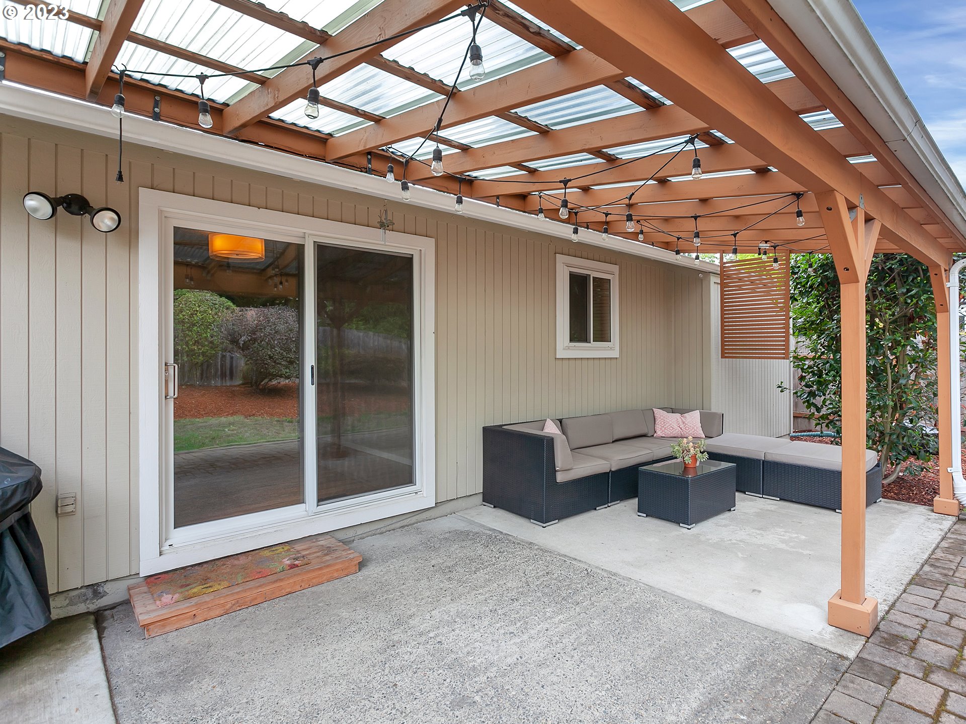 5715 Southwest Pendleton Street Portland, OR 97221 - Photo 19 of 31 a outdoor space with patio furniture and a potted plant