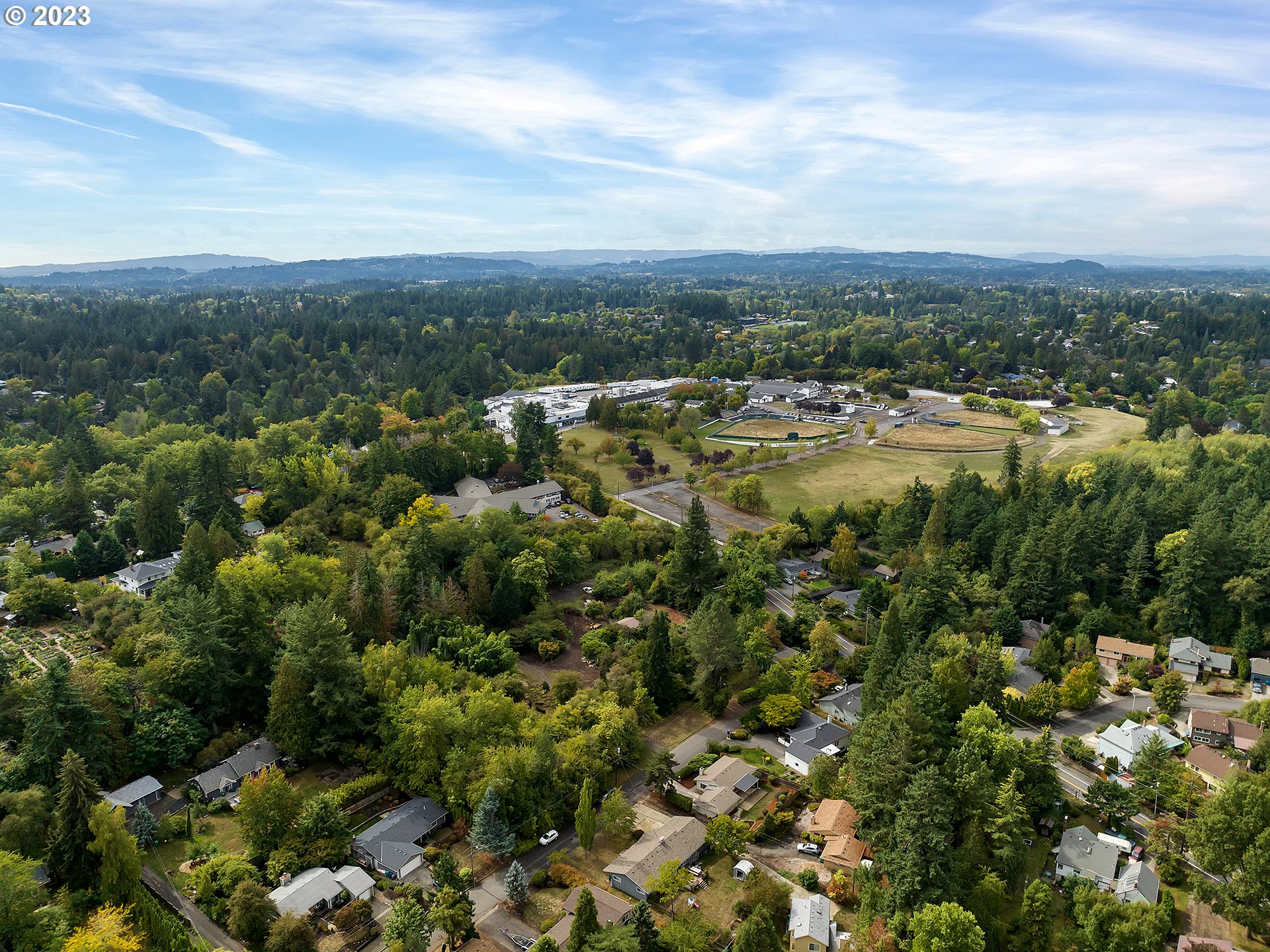 5715 Southwest Pendleton Street Portland, OR 97221 - Photo 26 of 31 an aerial view of residential houses with outdoor space and trees