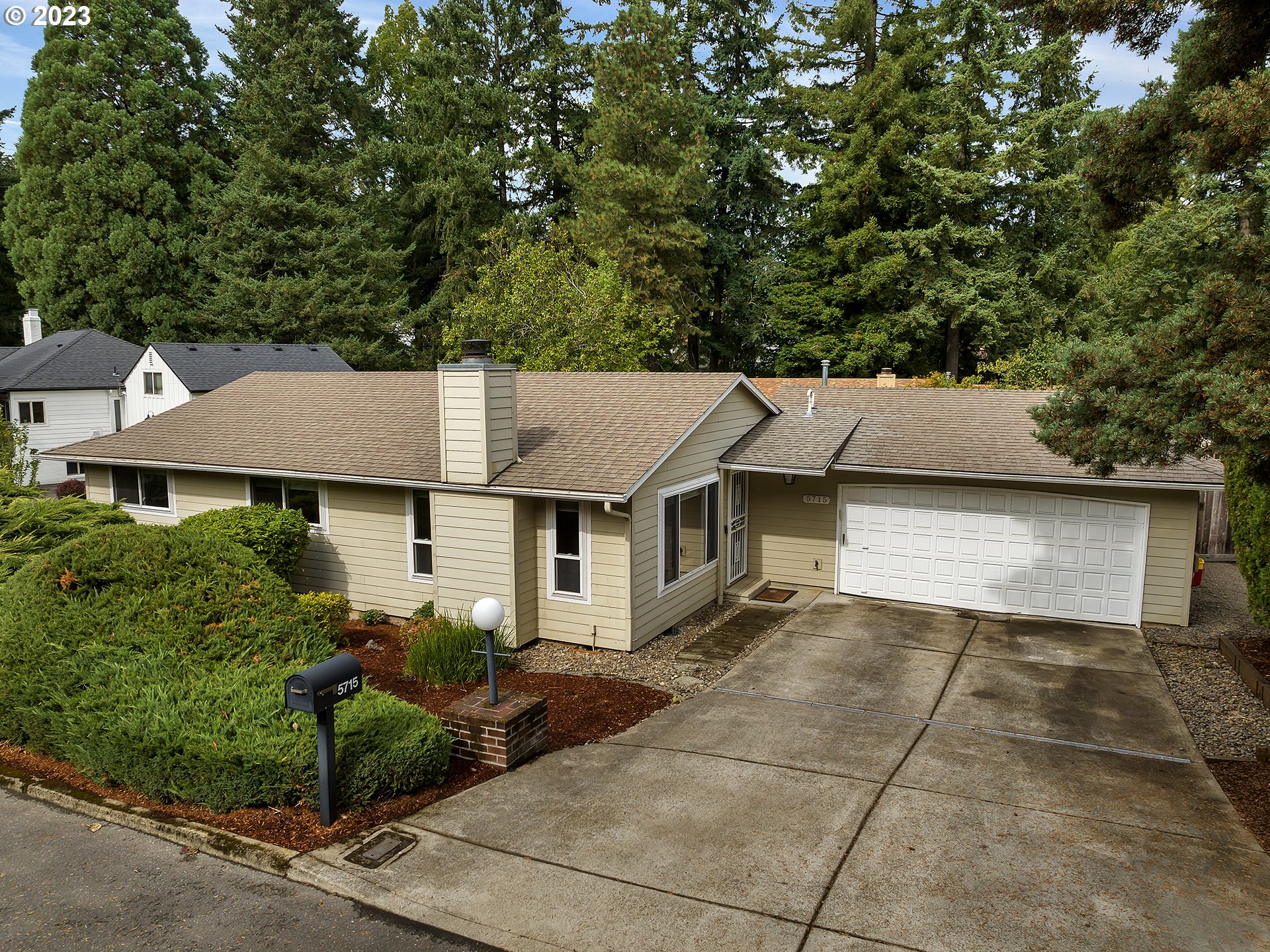 5715 Southwest Pendleton Street Portland, OR 97221 - Photo 30 of 31 front view of a house with a street