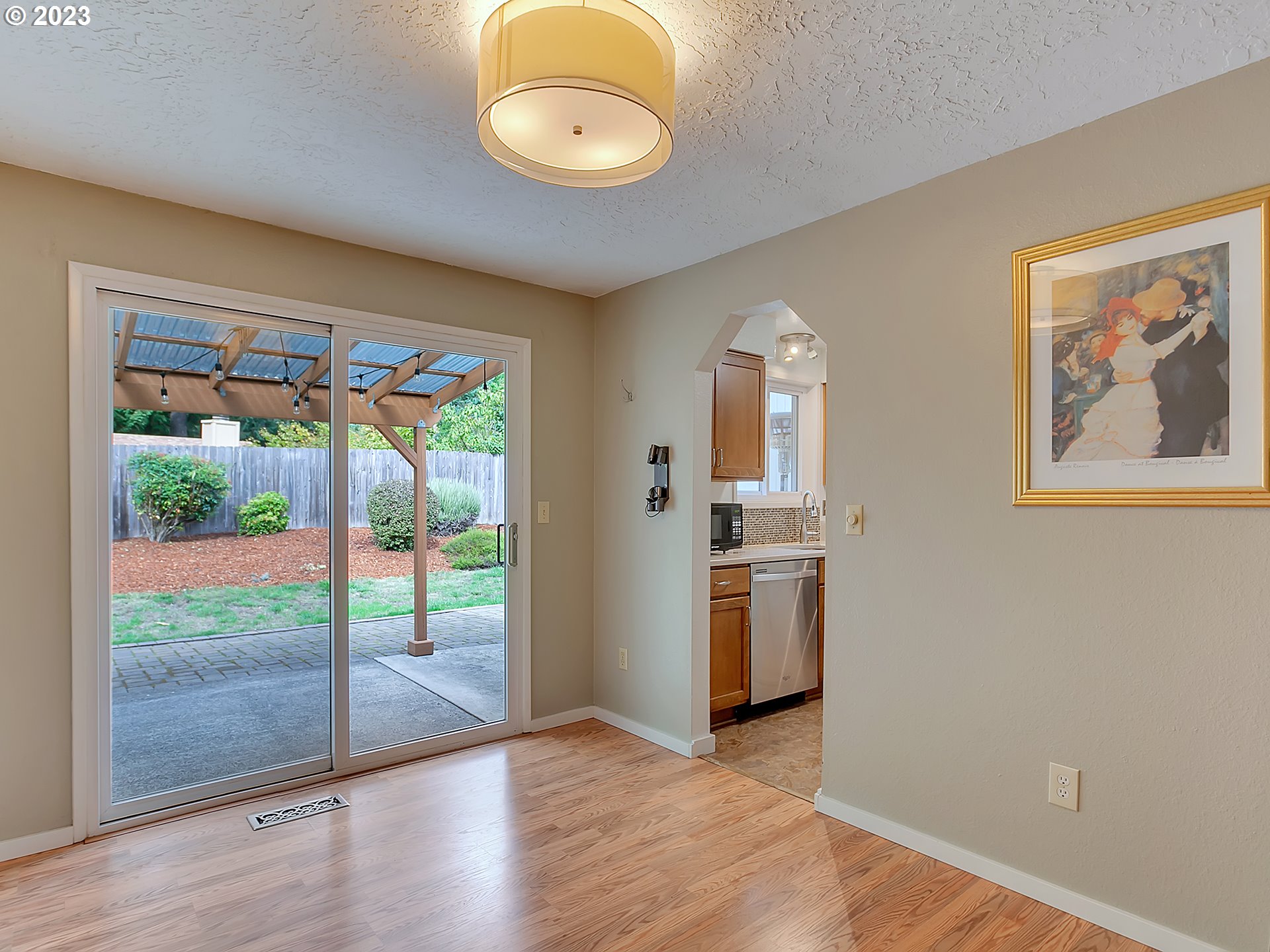 5715 Southwest Pendleton Street Portland, OR 97221 - Photo 5 of 31 wooden floor in an empty room with a window