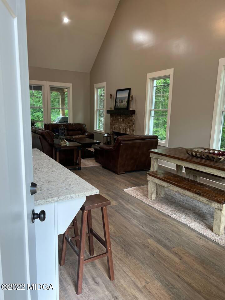 142 Towaliga Road Forsyth, GA 31029 - Photo 6 of 21 a living room with furniture and a flat screen tv