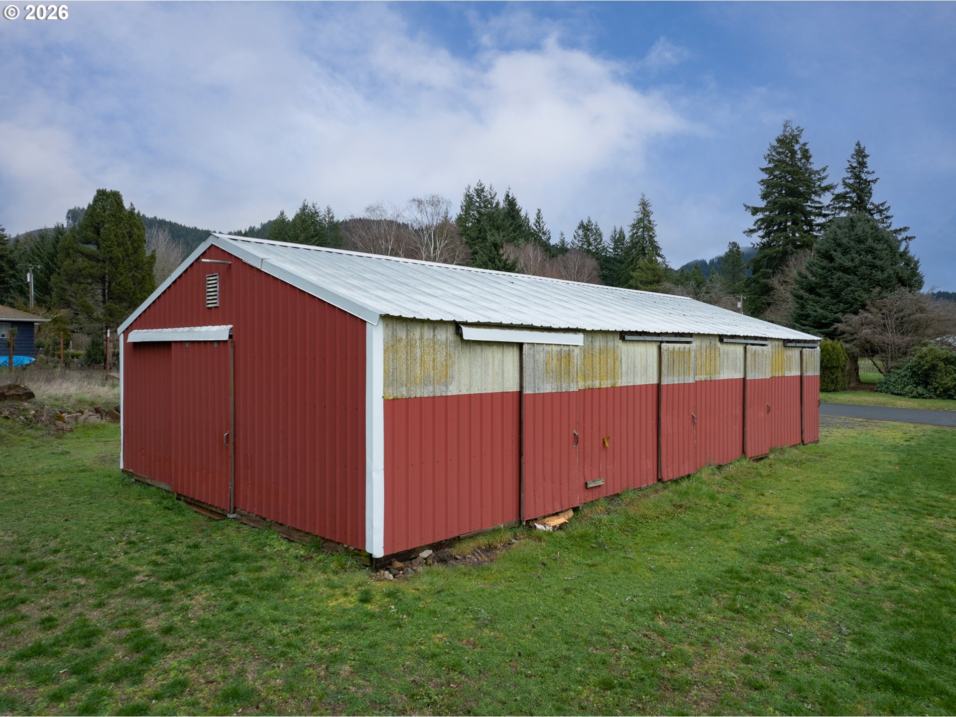 a view of backyard with green space