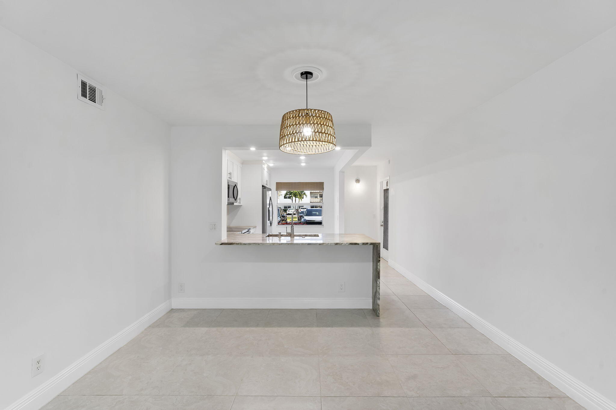 1037 Guilford C Boca Raton, FL 33434 - Photo 13 of 35 a view of a hallway to a room