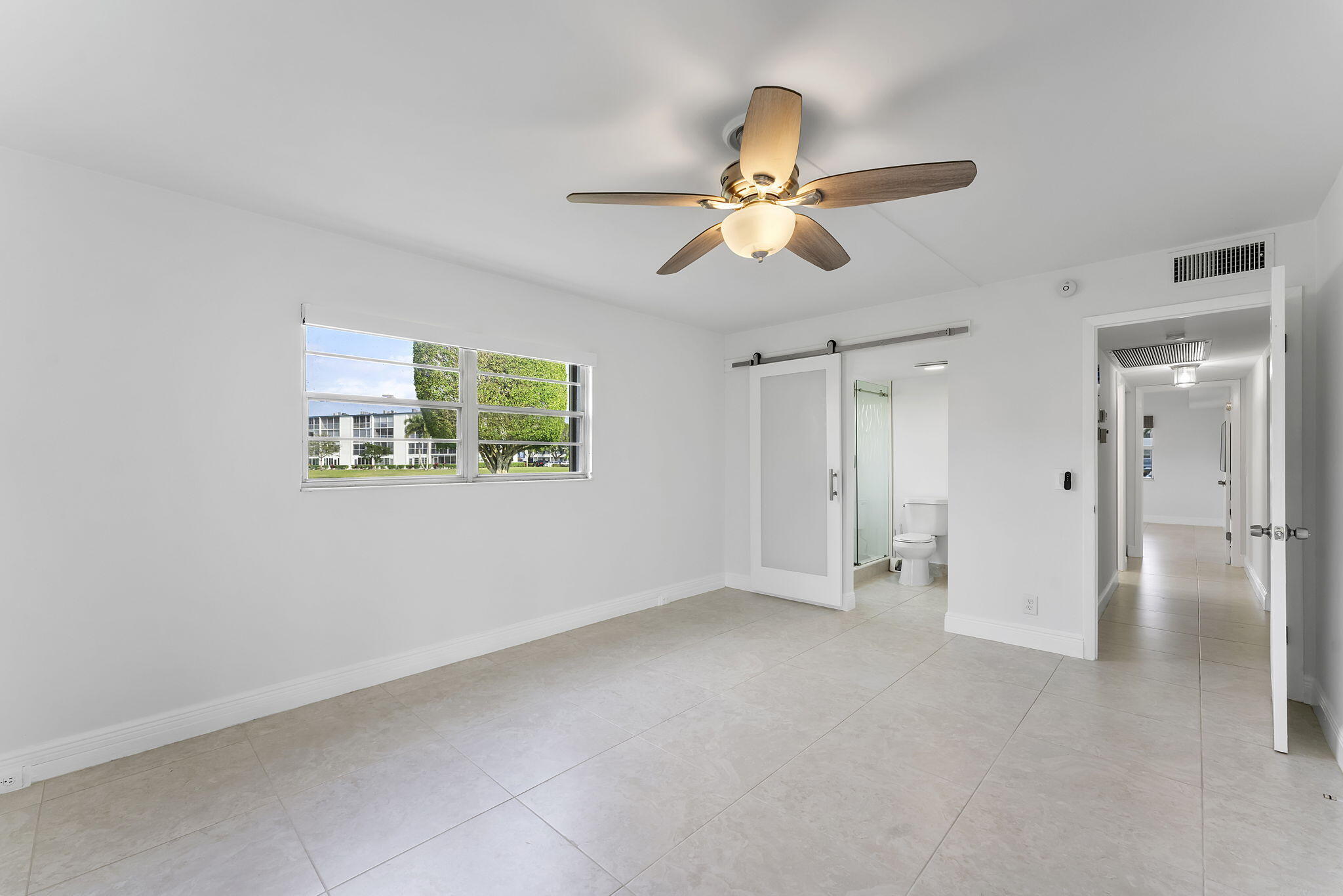 1037 Guilford C Boca Raton, FL 33434 - Photo 14 of 35 a view of an empty room