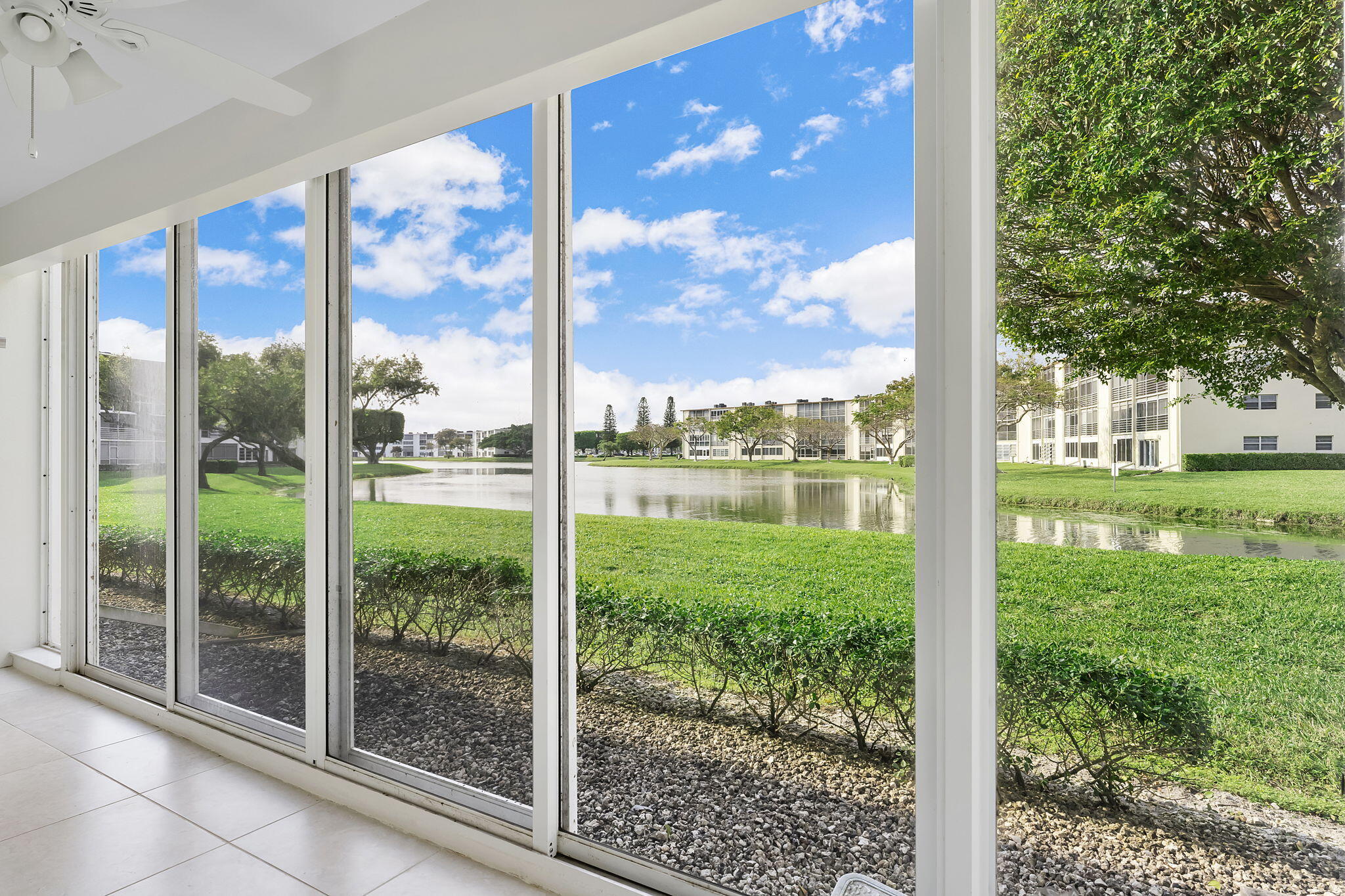 1037 Guilford C Boca Raton, FL 33434 - Photo 24 of 35 a view of outdoor space and backyard