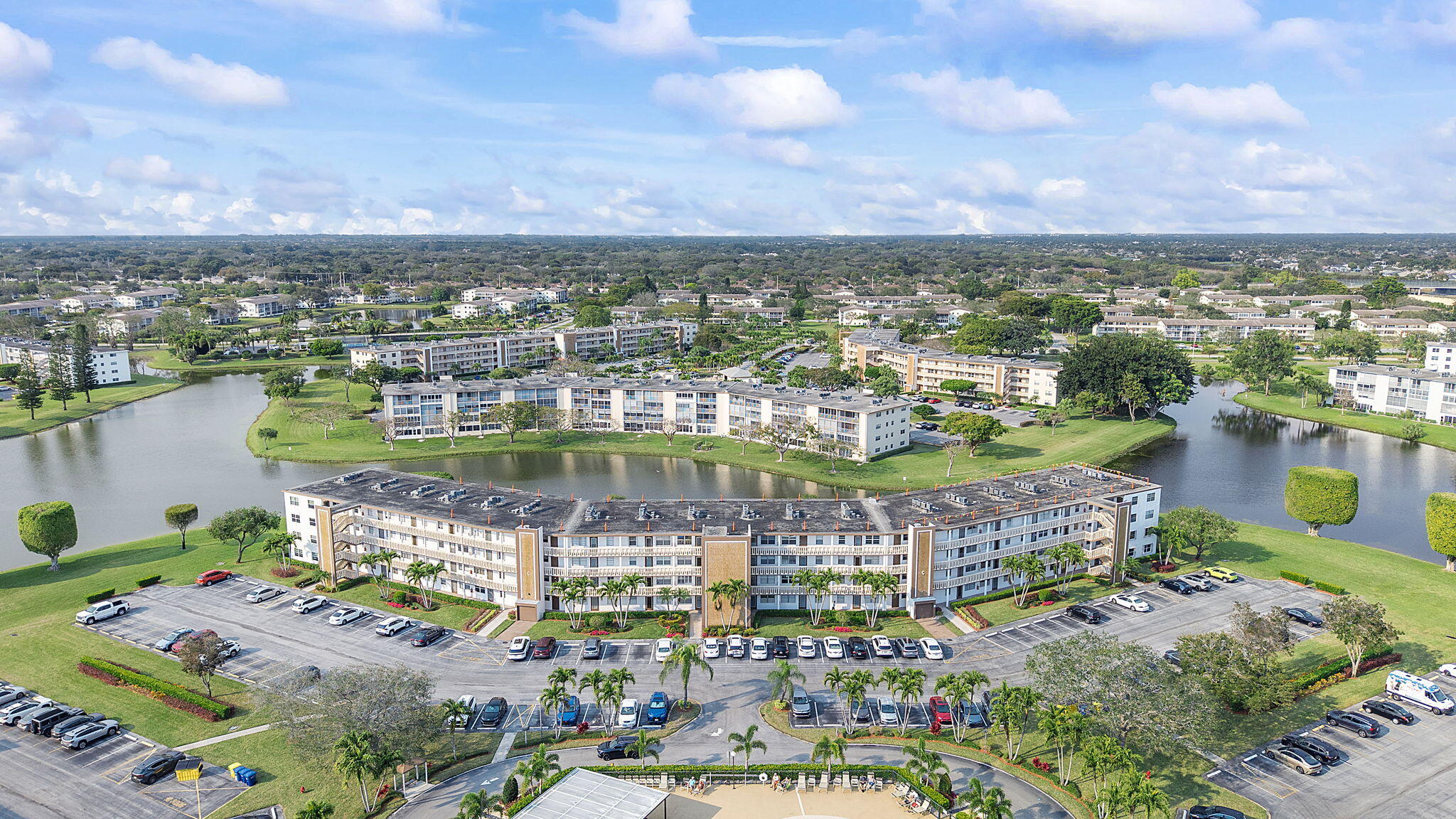 1037 Guilford C Boca Raton, FL 33434 - Photo 30 of 35 a view of a city with tall buildings