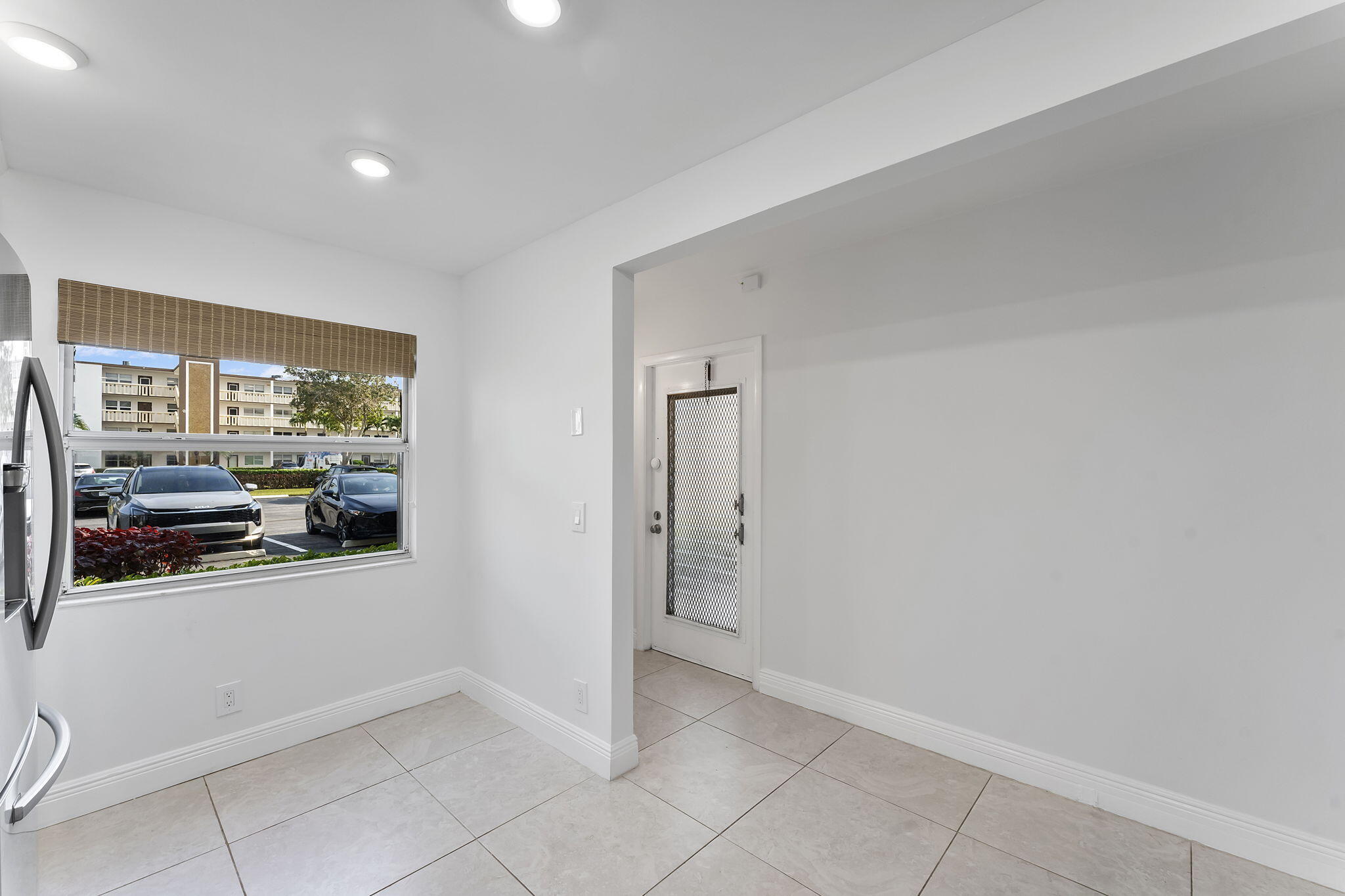 1037 Guilford C Boca Raton, FL 33434 - Photo 7 of 35 a view of a room with a window and storage