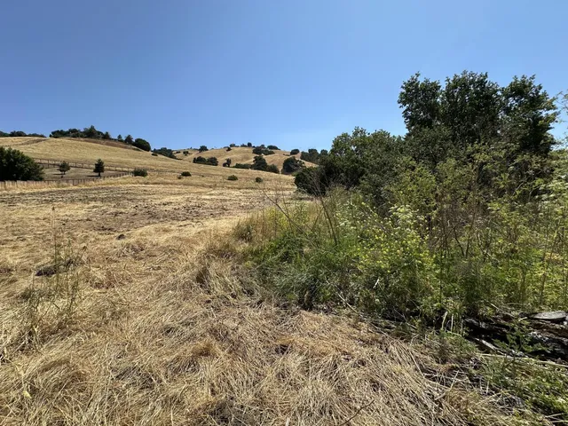 a view of lake and mountain