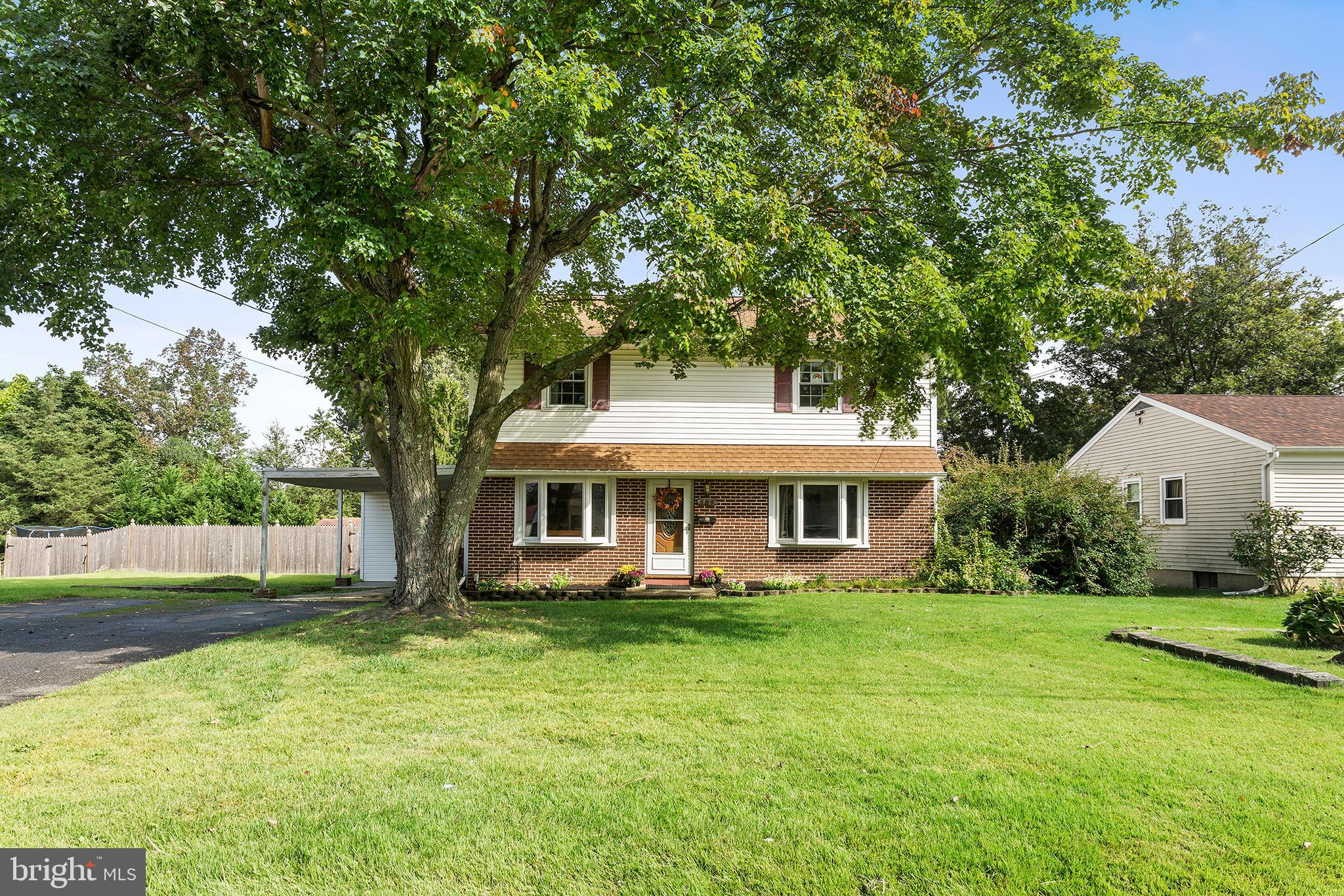 409 Franklin Road Glassboro, NJ 08028 - Photo 1 of 30 a front view of house with yard and green space